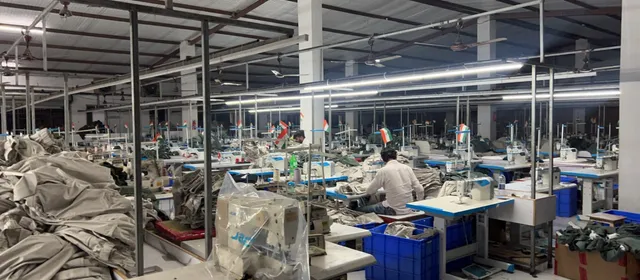 Rows of knitting machines running on the ChillCare assembly line